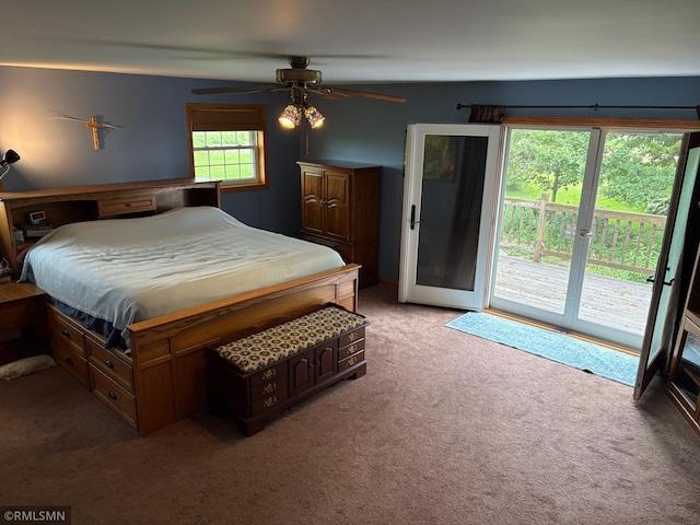 W5168 Lake Rd, Warner Twp, WI 54437 - bedroom with access to exterior, light colored carpet, and ceiling fan