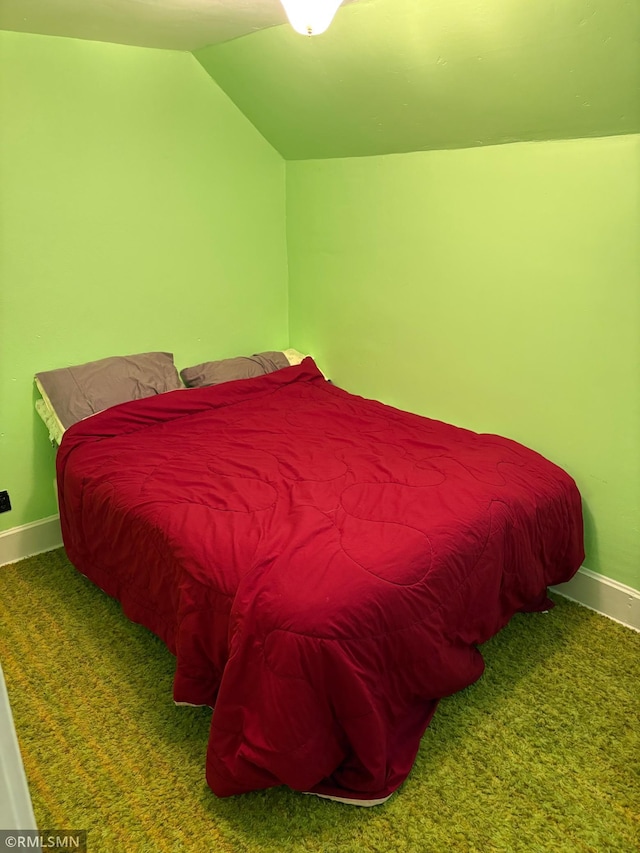 W5168 Lake Rd, Warner Twp, WI 54437 - bedroom with vaulted ceiling and carpet