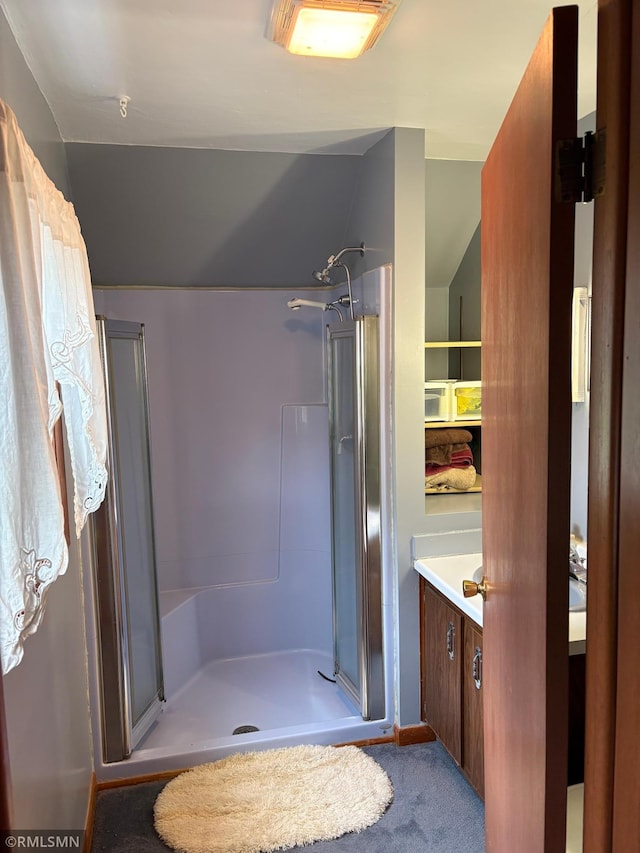 W5168 Lake Rd, Warner Twp, WI 54437 - full bath featuring a shower stall and vanity