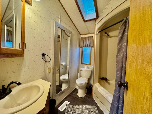 15827 Wilderness Trl Unit 28, Crosslake, MN 56442 - full bathroom with lofted ceiling, wood finished floors, vanity, and shower / bath combination with curtain