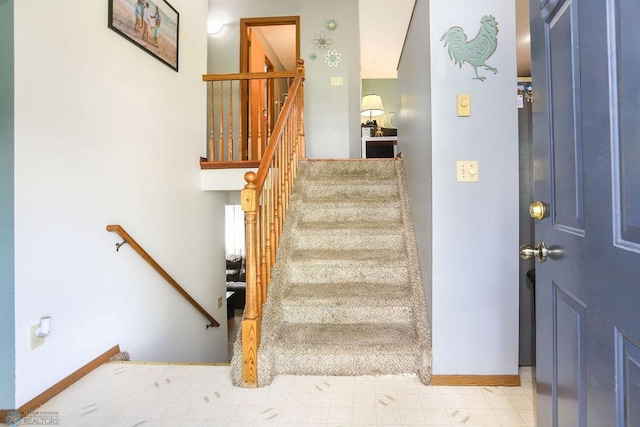 1426 11th St W, West Fargo, ND 58078 - staircase featuring baseboards