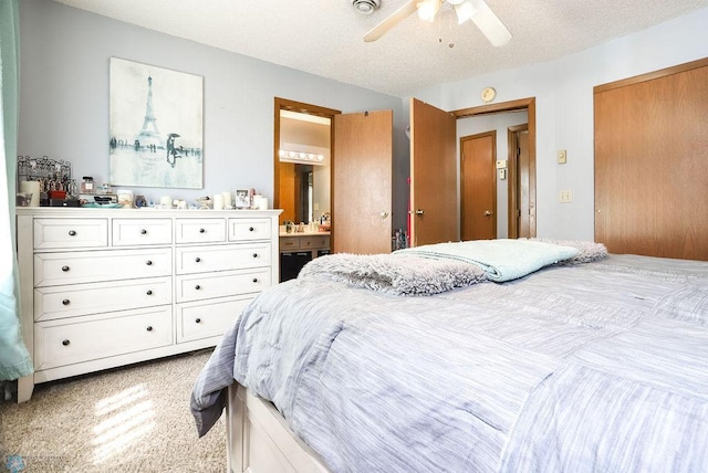 1426 11th St W, West Fargo, ND 58078 - bedroom featuring carpet floors, ensuite bath, and ceiling fan