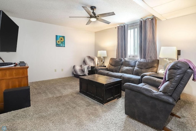 1426 11th St W, West Fargo, ND 58078 - living room featuring a ceiling fan, light carpet, and a textured ceiling