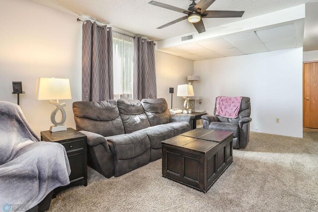 1426 11th St W, West Fargo, ND 58078 - living area with light colored carpet and a ceiling fan