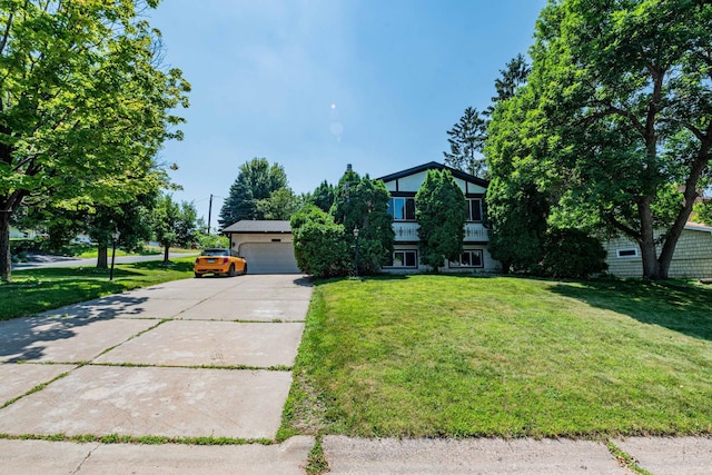 1290 Polk Pl, Columbia Heights, MN 55421 - view of front of property with a front lawn and driveway