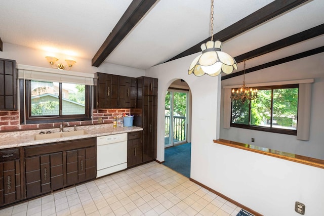 1290 Polk Pl, Columbia Heights, MN 55421 - kitchen with a chandelier, dark brown cabinetry, light countertops, and plenty of natural light