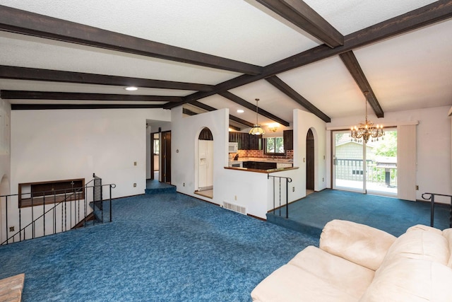 1290 Polk Pl, Columbia Heights, MN 55421 - living area featuring a chandelier, carpet flooring, arched walkways, and recessed lighting