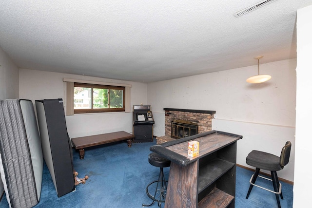 1290 Polk Pl, Columbia Heights, MN 55421 - living room featuring a textured ceiling and carpet
