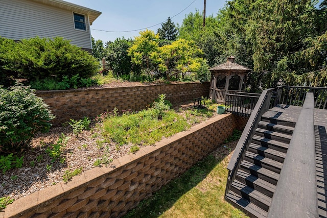 1290 Polk Pl, Columbia Heights, MN 55421 - view of yard with stairs, a gazebo, and a deck