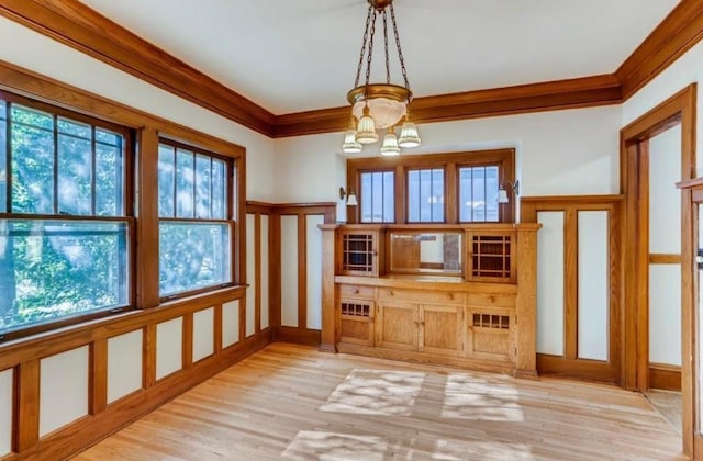4105 Columbus Ave, Minneapolis, MN 55407 - unfurnished sunroom featuring a chandelier and plenty of natural light