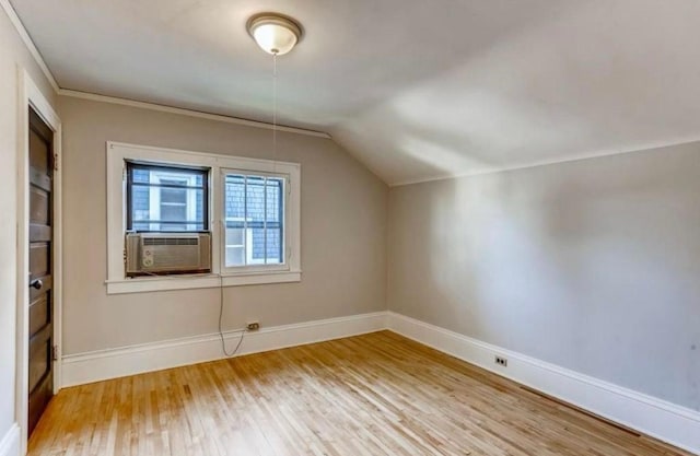 4105 Columbus Ave, Minneapolis, MN 55407 - bonus room with hardwood / wood-style floors, cooling unit, and vaulted ceiling