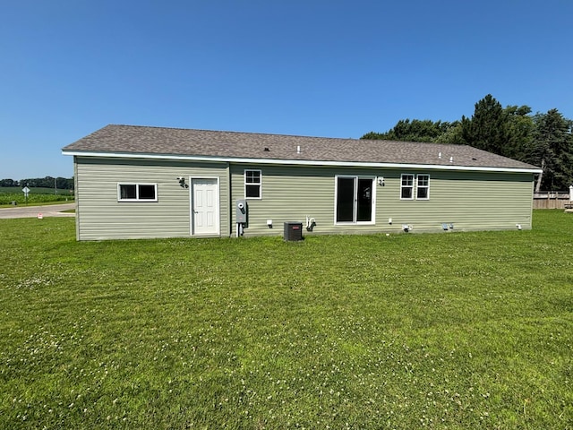 675 Brooks St S, Eden Valley, MN 55329 - back of house with a lawn