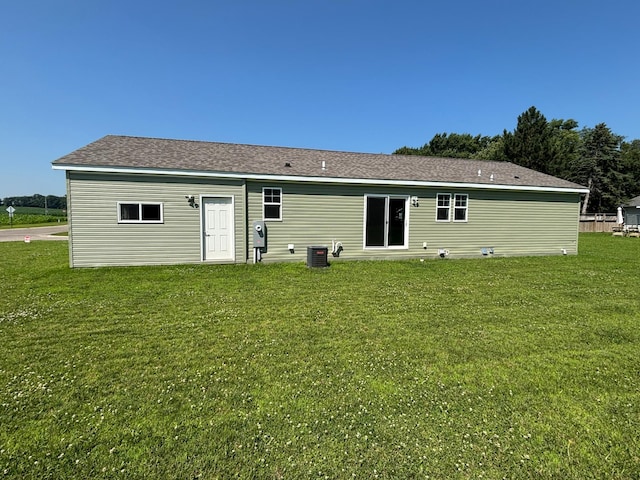 675 Brooks St S, Eden Valley, MN 55329 - back of house with a yard