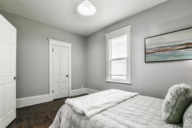 3339 Aldrich Ave N, Minneapolis, MN 55412 - bedroom with wood-type flooring and multiple windows