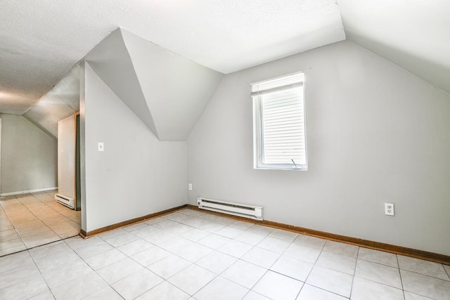 3339 Aldrich Ave N, Minneapolis, MN 55412 - bonus room featuring a baseboard radiator, lofted ceiling, and a textured ceiling