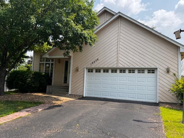 14886 Crandall Ave W, Rosemount, MN 55068 - view of front of property featuring driveway and a garage