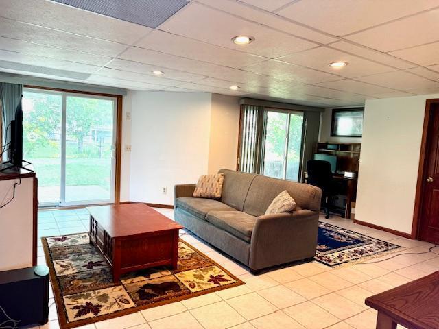 14886 Crandall Ave W, Rosemount, MN 55068 - living room featuring tile patterned floors, recessed lighting, a drop ceiling, and a desk