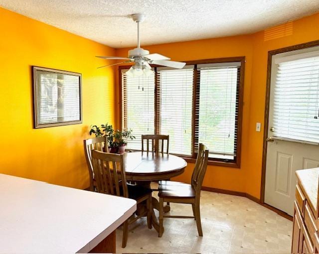 14886 Crandall Ave W, Rosemount, MN 55068 - dining room with a ceiling fan, a textured ceiling, and light flooring