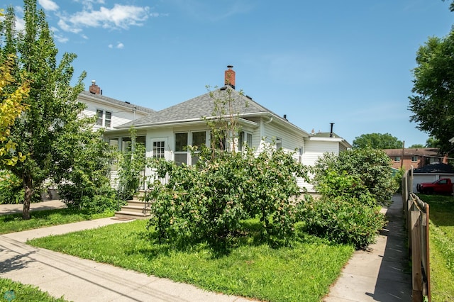 1137 11th St N, Fargo, ND 58102 - view of front of property with roof with shingles