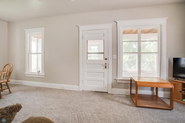 1137 11th St N, Fargo, ND 58102 - carpeted living area with baseboards