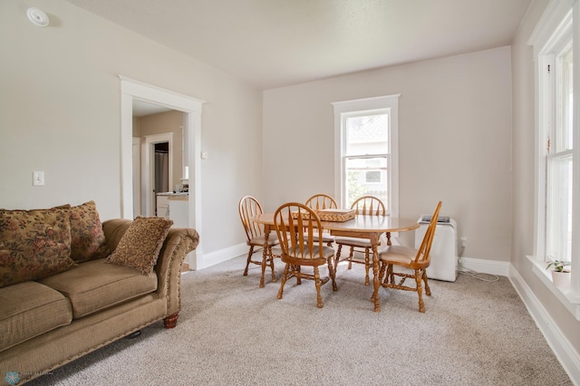 1137 11th St N, Fargo, ND 58102 - dining space featuring light carpet