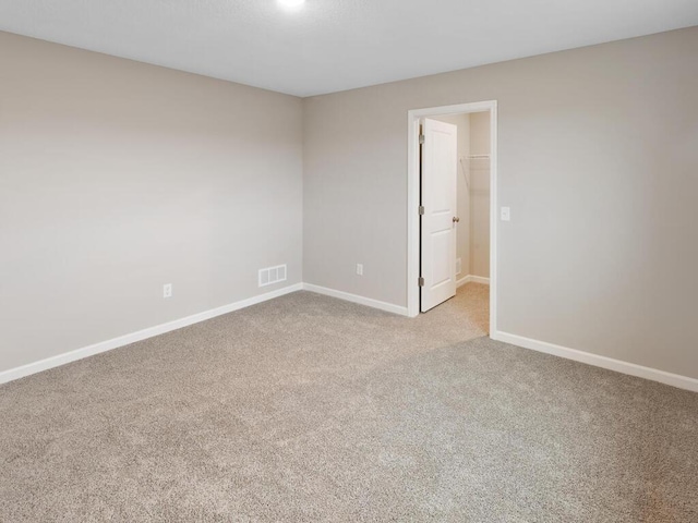 6711 Granby St, North Branch, MN 55056 - unfurnished room with carpet floors and baseboards