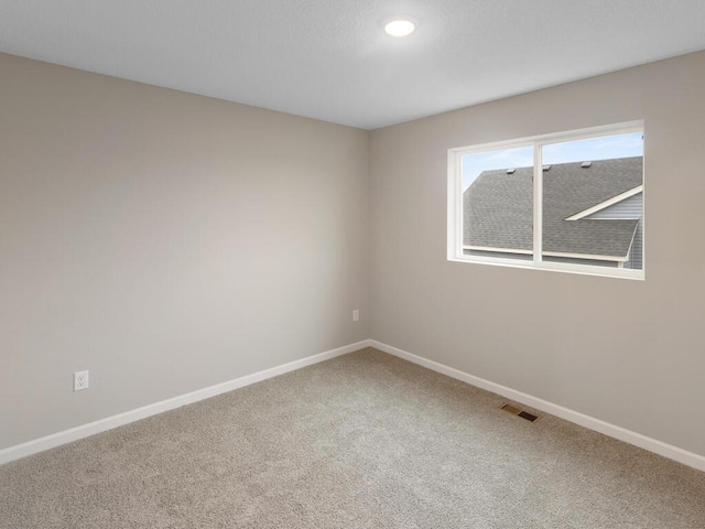 6711 Granby St, North Branch, MN 55056 - carpeted spare room featuring baseboards and recessed lighting