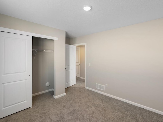 6711 Granby St, North Branch, MN 55056 - unfurnished bedroom with carpet flooring and a closet