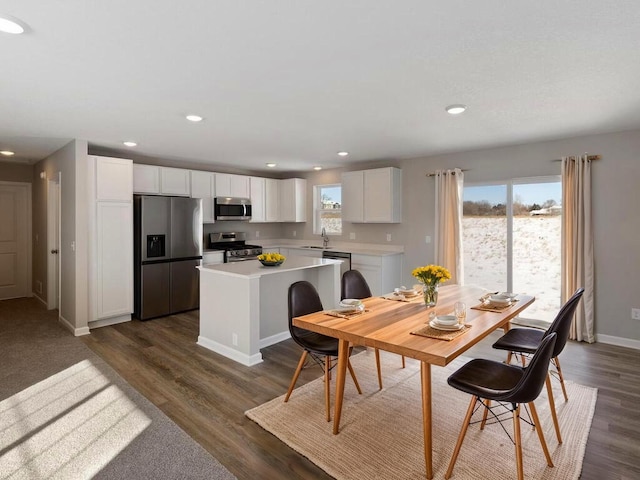 6711 Granby St, North Branch, MN 55056 - dining area featuring dark wood-style flooring and recessed lighting