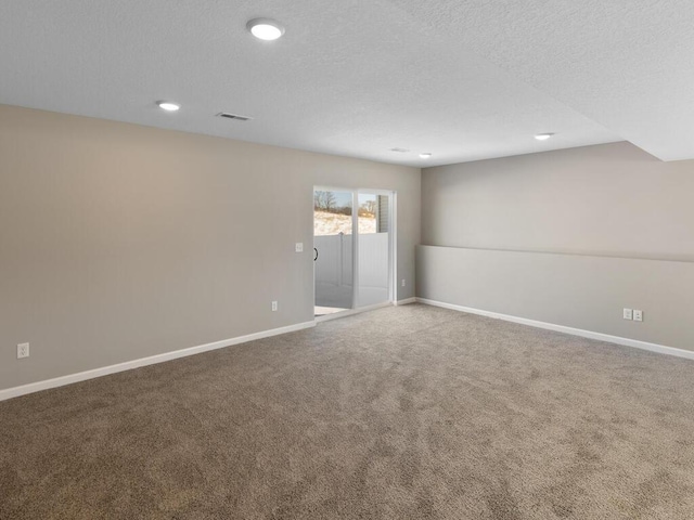 6711 Granby St, North Branch, MN 55056 - carpeted spare room with recessed lighting and a textured ceiling