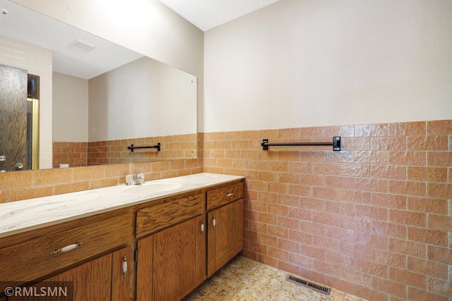 5733 Riverview Entry, Champlin, MN 55316 - bathroom with vanity and wainscoting
