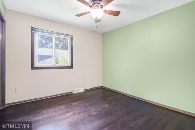 5733 Riverview Entry, Champlin, MN 55316 - unfurnished room featuring dark wood-type flooring and a ceiling fan