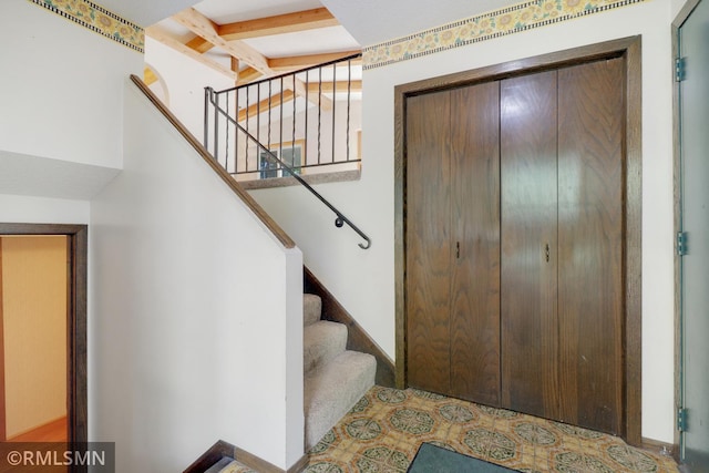 5733 Riverview Entry, Champlin, MN 55316 - staircase with beamed ceiling