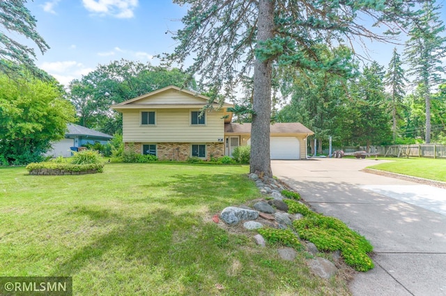 5733 Riverview Entry, Champlin, MN 55316 - view of front facade with concrete driveway, a garage, and brick siding