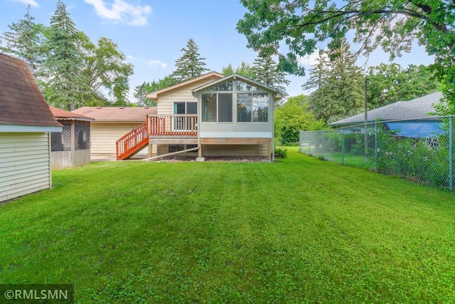 5733 Riverview Entry, Champlin, MN 55316 - back of property with a sunroom and stairs