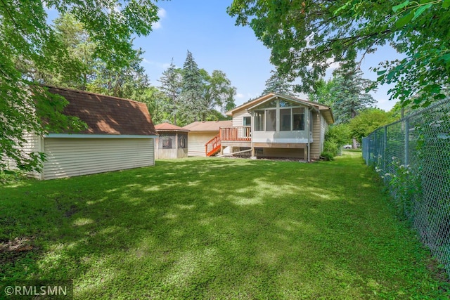 5733 Riverview Entry, Champlin, MN 55316 - back of house with a sunroom and stairs