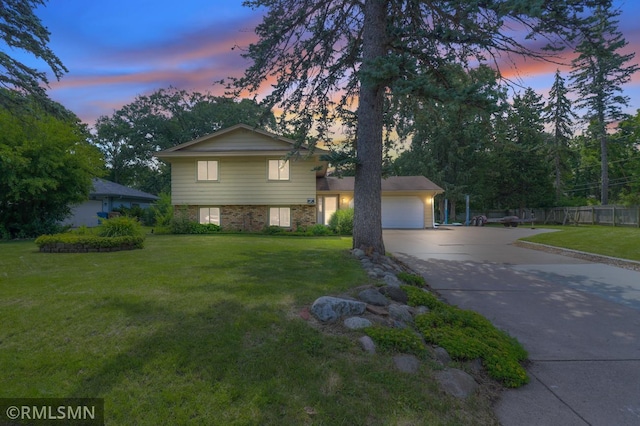 5733 Riverview Entry, Champlin, MN 55316 - tri-level home with concrete driveway and a garage