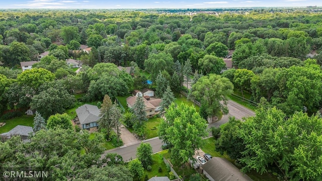 5733 Riverview Entry, Champlin, MN 55316 - aerial view of property and surrounding area with a heavily wooded area