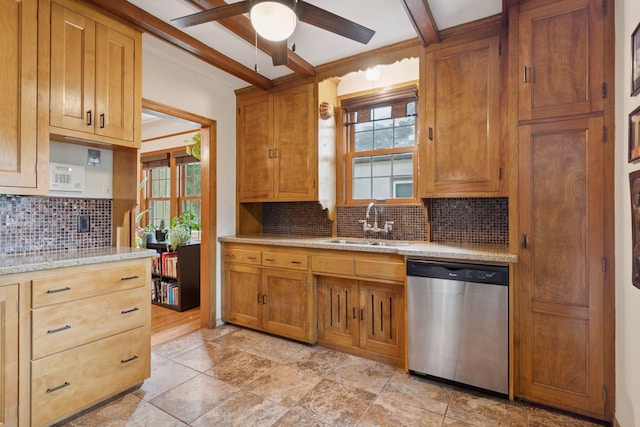 3607 Sheridan Ave N, Minneapolis, MN 55412 - kitchen featuring stainless steel dishwasher, ceiling fan, backsplash, brown cabinets, and light stone counters