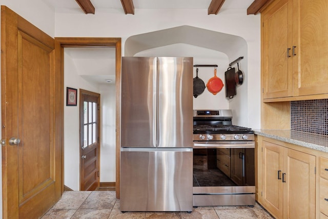 3607 Sheridan Ave N, Minneapolis, MN 55412 - kitchen with stainless steel appliances, beam ceiling, decorative backsplash, light stone counters, and light brown cabinets