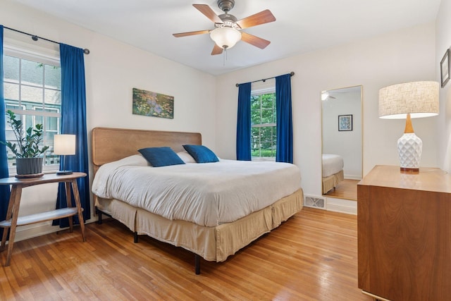 3607 Sheridan Ave N, Minneapolis, MN 55412 - bedroom with light wood-style floors and ceiling fan