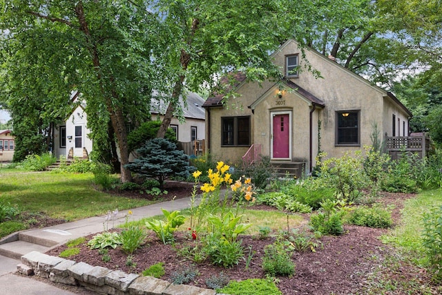 3607 Sheridan Ave N, Minneapolis, MN 55412 - bungalow with stucco siding