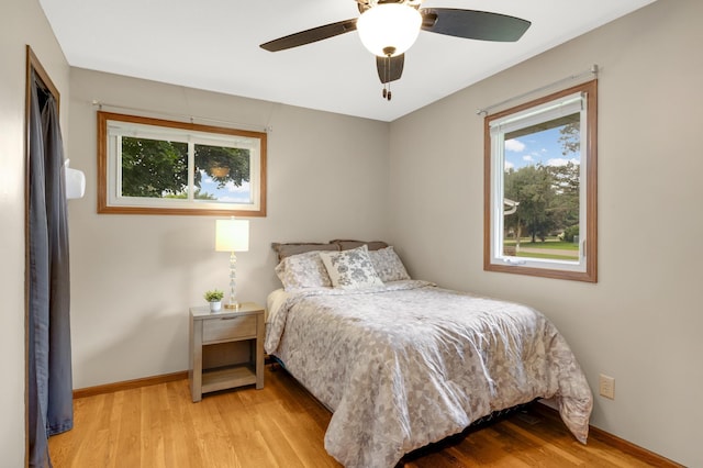 6700 168th St W, Lakeville, MN 55068 - bedroom featuring light wood finished floors and a ceiling fan