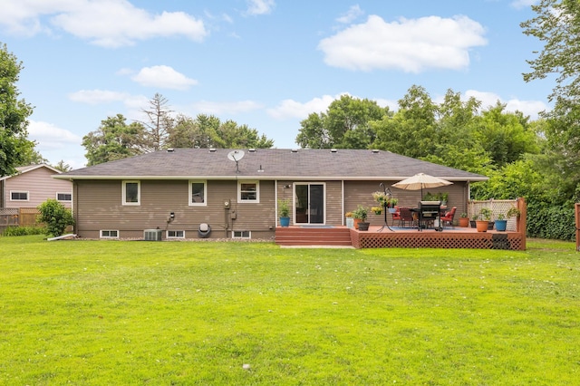 6700 168th St W, Lakeville, MN 55068 - rear view of house with a wooden deck and a lawn