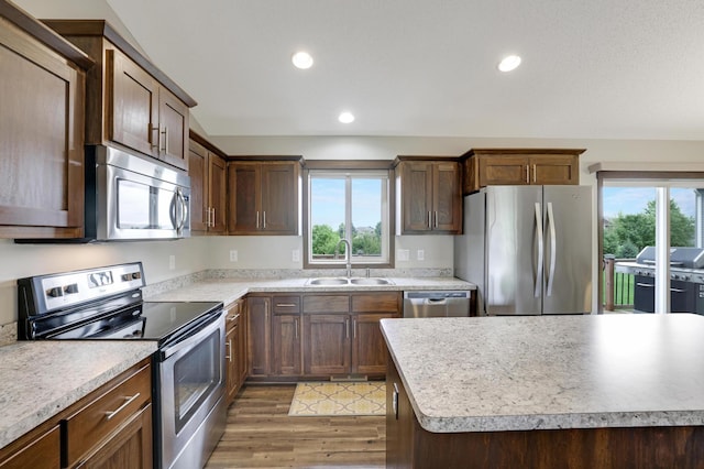 1035 Emerald St NE, Hanover, MN 55341 - kitchen with appliances with stainless steel finishes, plenty of natural light, light wood-style flooring, light countertops, and recessed lighting