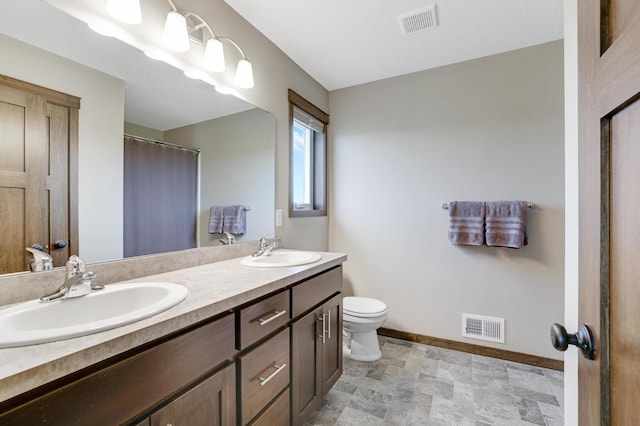 1035 Emerald St NE, Hanover, MN 55341 - full bathroom featuring double vanity, stone finish flooring, and curtained shower