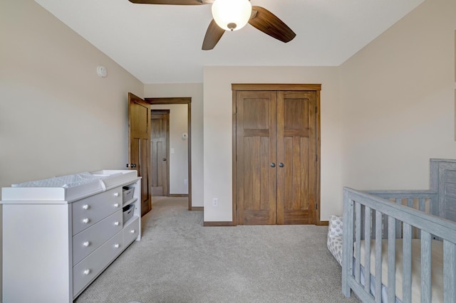 1035 Emerald St NE, Hanover, MN 55341 - bedroom featuring light carpet, a closet, and a ceiling fan