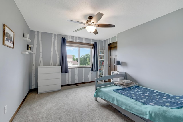 1035 Emerald St NE, Hanover, MN 55341 - carpeted bedroom with a ceiling fan and a textured ceiling