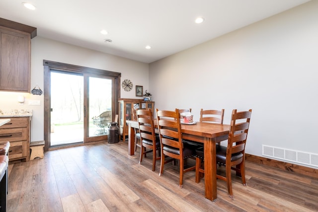 7170 29th Ave SW, Pequot Lakes, MN 56472 - dining room with light wood-style floors and recessed lighting