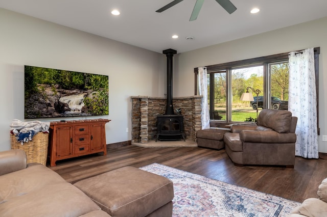 7170 29th Ave SW, Pequot Lakes, MN 56472 - living room featuring a wood stove, wood finished floors, ceiling fan, and recessed lighting